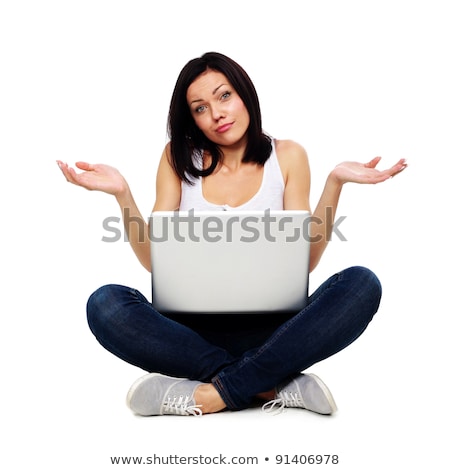 ストックフォト: Pretty Woman With Confused Expression Working On Laptop