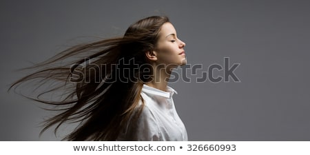 Brunette Beauty With Windswept Hair ストックフォト © lithian
