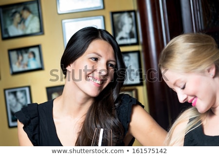 [[stock_photo]]: Vivacious Woman In A Cocktail Dress