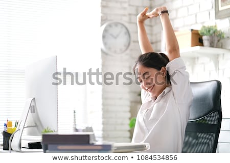 Stok fotoğraf: Beautiful Business Lady Sitting On The Office Chair