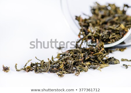 Foto stock: Heap Of Loose Tea Oolong On White
