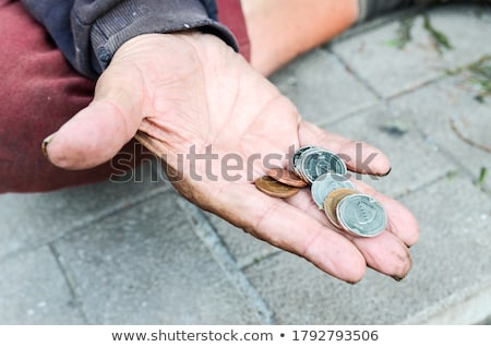 Stockfoto: Poor Male Beggar Asking For Charity Money And Help