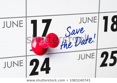 Foto stock: Wall Calendar With A Red Pin - June 17