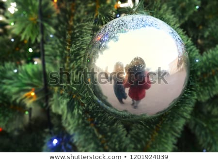 ストックフォト: Woman And Man With Ornamented Christmas Balls