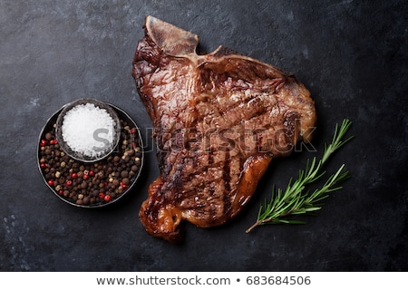 Foto stock: Grilled T Bone Steak On Dark Background