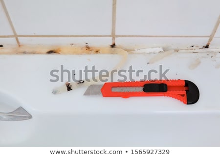 Stockfoto: Bathroom Renovation Old Silicone Removal