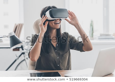 Zdjęcia stock: Businesswoman With Virtual Reality Glasses In Office