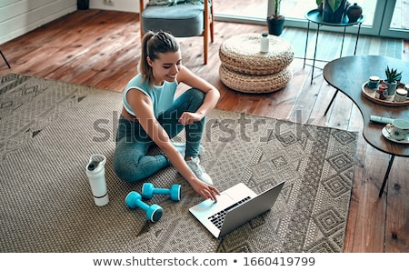 Foto stock: Beautiful Young Fit Body Of Sports Woman Sitting