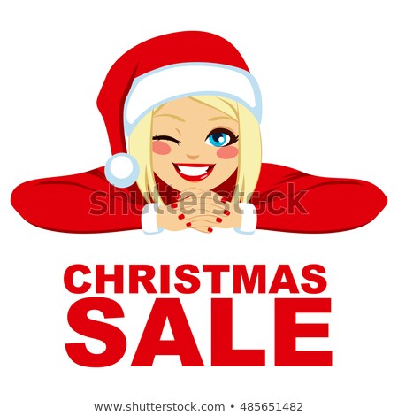 Stockfoto: Young Blond Woman In Santa Hat Winking