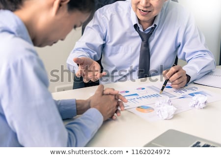 Foto stock: Working In The Office Manager Is Not Satisfied The Argument Bu
