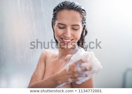 Stockfoto: Woman Is Taking A Shower And Relaxing