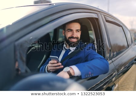 [[stock_photo]]: Handsome Man Driving His Car Lifestyle Outdoors Portrait