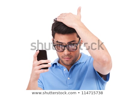 [[stock_photo]]: Fashion Man Sitting And Fixing His Hair