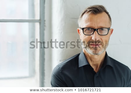 Foto stock: Close Up Middle Age Man Smiling At The Camera