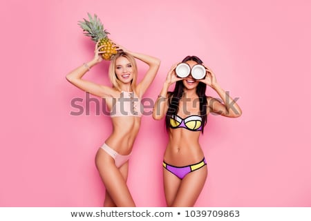 Stok fotoğraf: Pretty Beautiful Beach Girl In Bikini Holding Pineapple