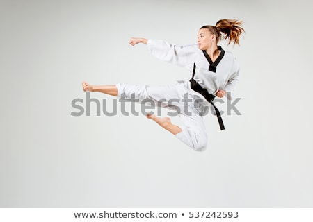 Foto stock: The Karate Girl With Black Belt