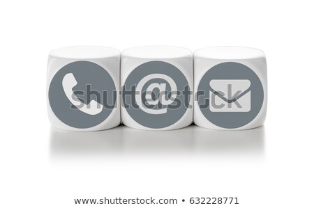 Stock photo: Letter Dice On A White Background - Contact