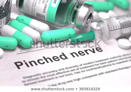 Foto stock: Diagnosis - Pinched Nerve Medical Concept With Blurred Background