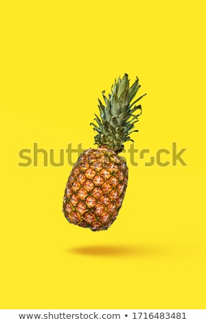 Foto d'archivio: Green Leaf And Slices Of Ripe Organic Pineapple On A Blue Background With Space For Text Flat Lay