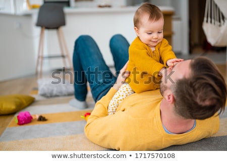 Imagine de stoc: Happy Young Father Playing With Little Daughter