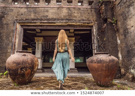 Foto d'archivio: Woman Tourist In Abandoned And Mysterious Hotel In Bedugul Indonesia Bali Island Bali Travel Conc