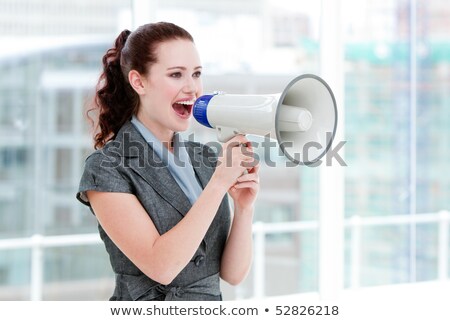 Stock fotó: Delighted Businesswoman Shouting Through A Megaphone