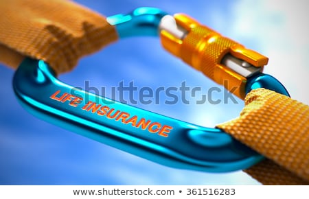 Foto d'archivio: Life Insurance On Blue Carabine With A Orange Ropes