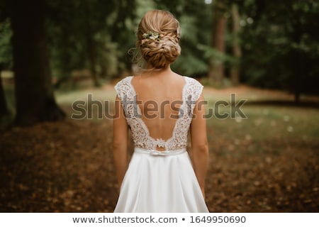 Foto stock: Beautiful Girl In Dress With Braided Hair