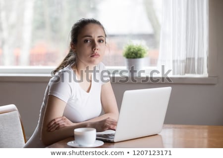 [[stock_photo]]: Upset Girl Looking At Camera In Kitchen