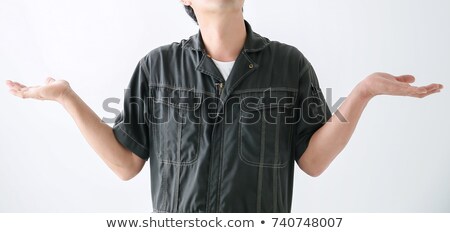 Foto stock: Asian Confused Mechanic Shrugging Shoulders