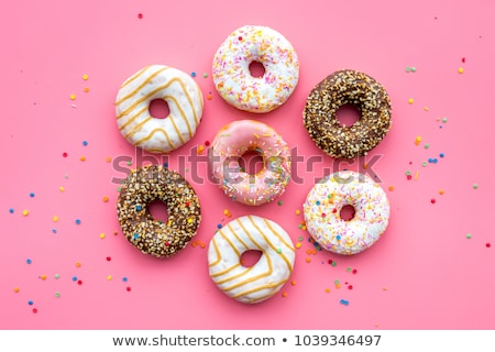 Stockfoto: Delicious Donut With Icing And Sprinkles