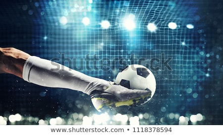 [[stock_photo]]: Close Up Of A Soccer Striker Ready To Kicks The Ball At The Stadium