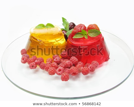 [[stock_photo]]: Cocktail Glass With Orange Jelly Dessert