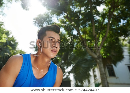 Stock foto: Sweaty Asian Athlete After Marathon