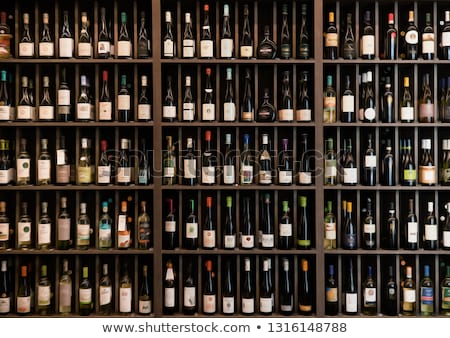 Stock photo: Wine Bottles On Shelf