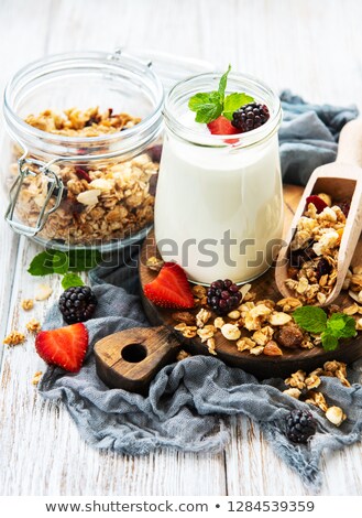 Yoghurts On The Wooden Table Foto stock © almaje