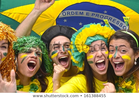 Excited Brazilian Football Fan Cheering Imagine de stoc © mangostock