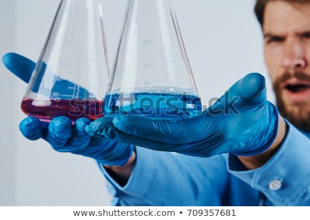 Zdjęcia stock: Close Up Portrait Of A Happy Young Man Holding Flask