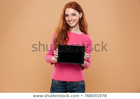 ストックフォト: Happy Young Woman Showing Blank Tablet Computer Screen