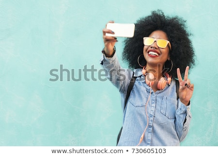 Foto stock: Young African American Woman Making Selfie
