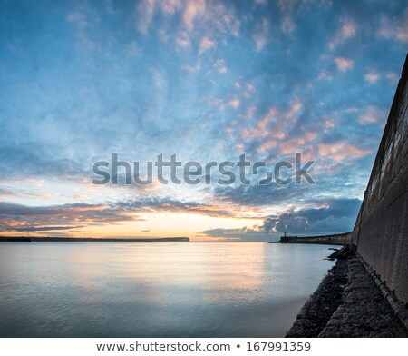 Stock photo: Beams From Sun In Blue Sky Gray Clouds Skyscape