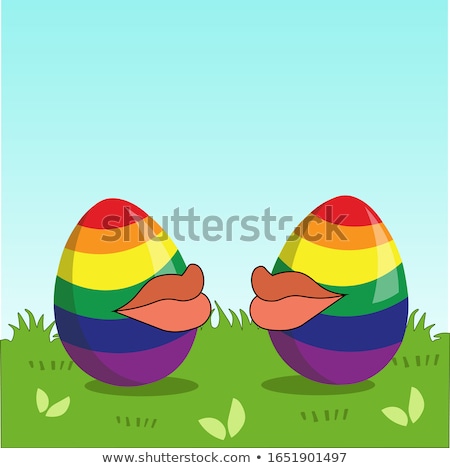 Foto d'archivio: Two Eggs Are Colored In The Colors Of The Rainbow As A Flag Of Gays And Lesbians As Well As Easter E
