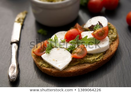 Stockfoto: Bruschetta With Tomatoes Mozzarella Cheese And Basil