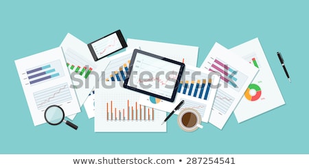 Stock fotó: Economy Statistics Report And Financial Papers Concept