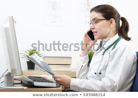 Stock photo: Nurse Talking On Her Cell