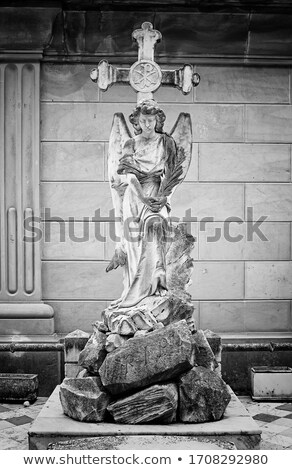 Stok fotoğraf: Cherub Angel And Cross In Cemetary