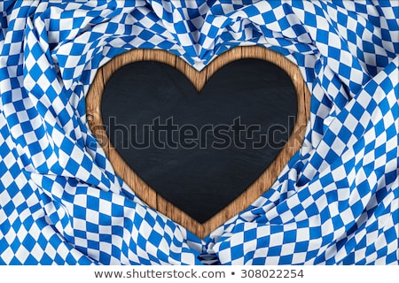 Stockfoto: Empty Blackboard On A Bavarian Diamond Pattern