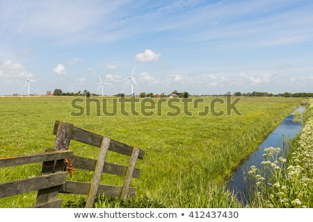 Stock photo: Modern Windmill In Friesland With Ditch
