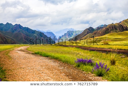 Foto stock: Landscape With Mountain Range Hills And Road