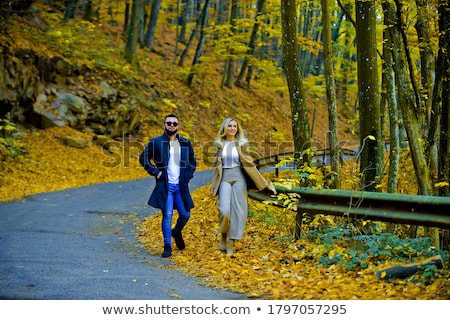 Foto stock: Fashionable Beautiful Young Girlfriends Walking Together In The